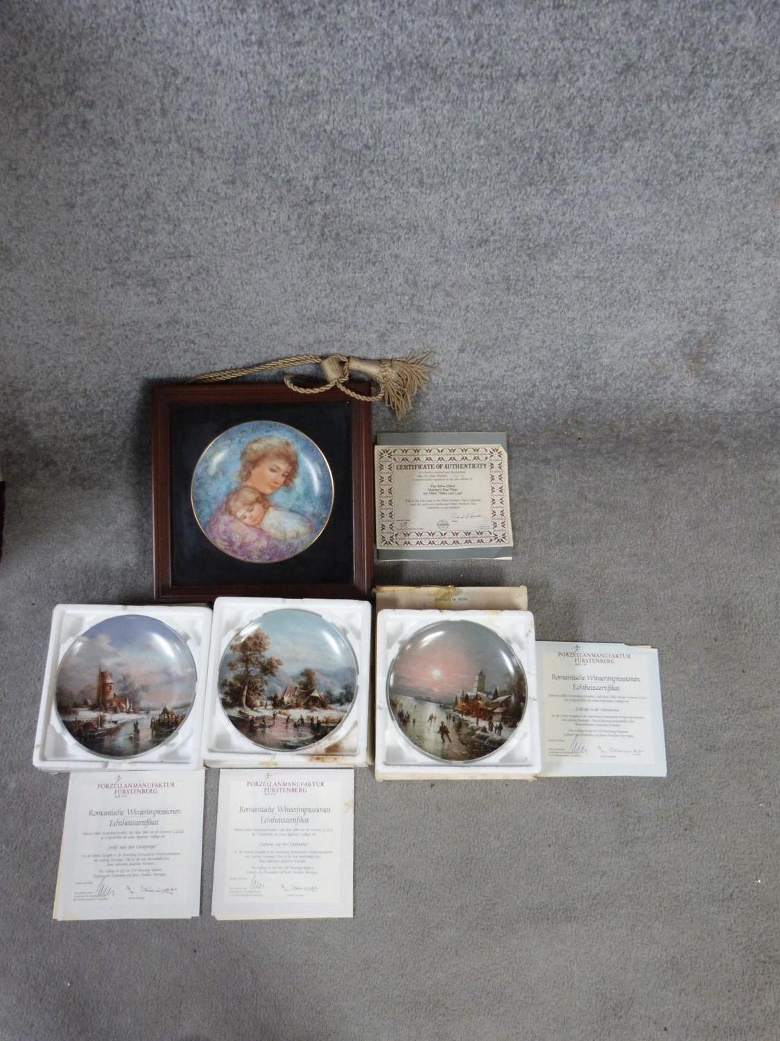 Four limited edition German porcelain plates with original boxes and certificates of authenticity.