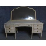 A mid 20th century mirror backed painted Georgian style dressing table with an arrangement of