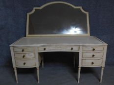 A mid 20th century mirror backed painted Georgian style dressing table with an arrangement of