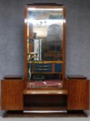 A vintage Continental Art Deco style rosewood teak and ebonised dressing table with central cheval