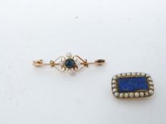 A Georgian yellow metal brooch and 15ct gold brooch. A Georgian closed back cluster brooch set