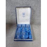 Set of six (one missing) boxed Bohemian Burgoyne lead crystal glasses made in original blue silk