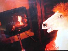 A surrelaist photographic print depicting a horse watching the television. 98x77cm