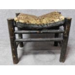 A Chinese bamboo stool on circular section stretchered supports. H.46 W.55 D.41cm