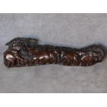 An African hardwood carving of a herd of elephants. 120x36cm