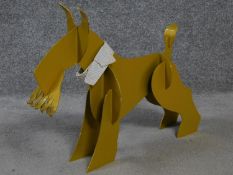 A metal painted sculpture of a Scottish Terrier with a striped collar to its neck by British
