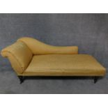 A 19th century chaise longue in lemon upholstery on mahogany turned tapering supports. H.77 W.190