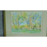 A framed and glazed watercolour of Highbury field by a British painter Anne Usborne. Signed by