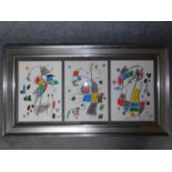 A framed and glazed triptych of Joan Miro coloured lithographs with certificate of authenticity.