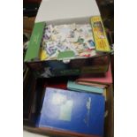 A QUANTITY OF ASSORTED STAMPS BOTH LOOSE AND IN ALBUMS