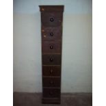 A TALL SEVEN DRAWER CABINET, 187 X 41 CM