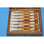 A CASED 7 PIECE SET OF POWER GRIP WOODCARVING TOOLS