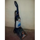 A VAX UPRIGHT CLEANER