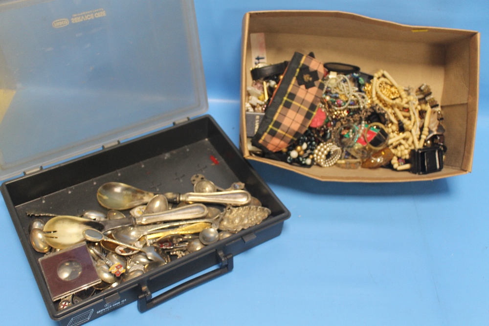 A COLLECTION OF COLLECTORS SPOONS, to include a berry spoon and horn servers and a collectioin of