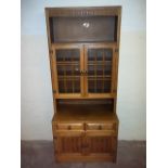 AN OAK DISPLAY CABINET