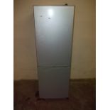 A SILVER FRIDGE FREEZER