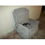 AN ELECTRIC RECLINER CHAIR