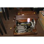 A CASED SINGER SEWING MACHINE