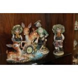 THREE CAPO DE MONTE FIGURE GROUPS TOGETHER WITH AN ITALIAN / GERMAN DECORATIVE CLOCK (4)