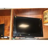 AN ALBA 32" FLATSCREEN TV