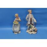 TWO HAND PAINTED WEDGWOOD FIGURES TITLED 'THE RAKE' AND 'THE FLOWER GIRL' (2)