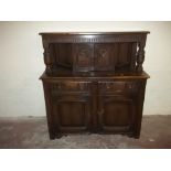 AN OAK COURT CUPBOARD