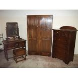 AN OAK WARDROBE, A CHEST OF DRAWERS, A DRESSING TABLE + A SEWING BOX (4)