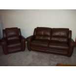 A BROWN LEATHER TWO PIECE SUITE