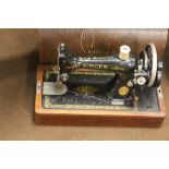 A SINGER SEWING MACHINE