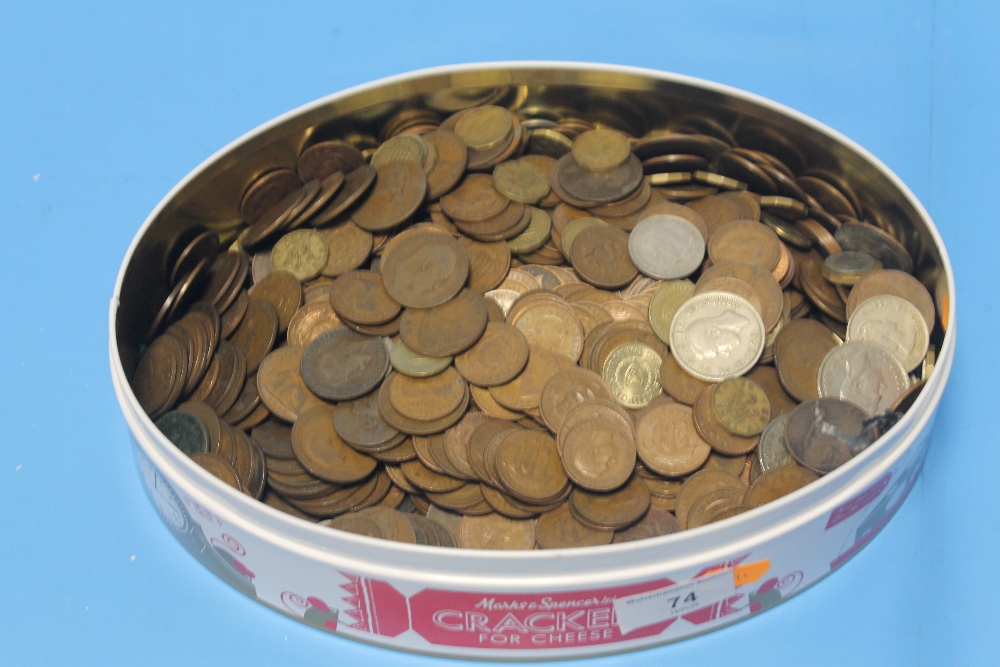 A TIN OF ASSORTED COINAGE