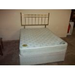 A DOUBLE DIVAN BED AND MATTRESS