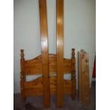 A HONEY PINE SINGLE BED FRAME