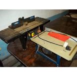 A TABLE SAW TOGETHER WITH A NUTOOL BENCH