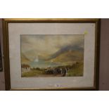 A GILT FRAMED AND GLAZED WATERCOLOUR DEPICTING A MOUNTAINOUS LAKE SCENE WITH HORSE AND CART SIGNED I