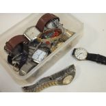 A TUB OF ASSORTED WRISTWATCHES
