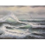 A LARGE GILT FRAMED OIL ON CANVAS DEPICTING CRASHING WAVES SIGNED JUNE NELSON W-99CM X H-69CM