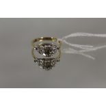 AN 18CT DIAMOND SOLITAIRE RING, the central stone being of an estimated 1.25 carats, ring size