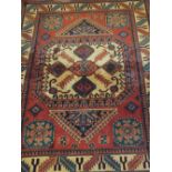 A 20TH CENTURY WOOLLEN EASTERN RUG 200 X 153 CM