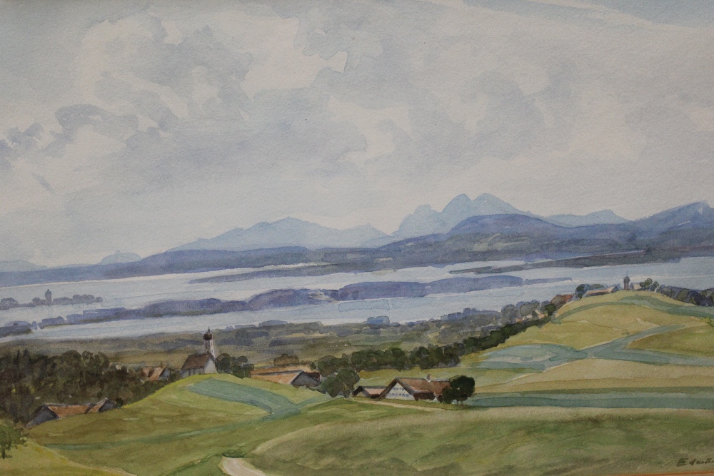 A FRAMED AND GLAZED WATERCOLOUR ENTITLED 'A VIEW OF DOUGLAS' SIGNED LOWER RIGHT