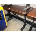 A WOODEN TOPPED CAST BASE PUB TABLE H-72 W-61 L-107 CM