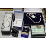 A BOX OF SILVER JEWELLERY ETC