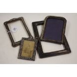 A COLLECTION OF HALLMARKED SILVER PICTURE FRAMES A/F, various styles and periods to include