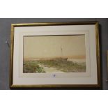 A GILT FRAMED WATERCOLOUR DEPICTING AN ESTUARY AT LOW TIDE SIGNED OSWALD GARSIDE