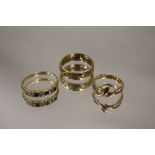 THREE 9 CARAT GOLD DRESS RINGS