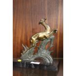 A SMALL BRONZE EFFECT FIGURE OF A LEAPING ANTELOPE ON MARBLE PLINTH