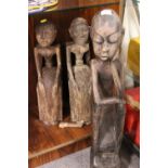 THREE FIGURAL TRIBAL STYLE CARVINGS
