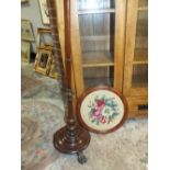 A VICTORIAN MAHOGANY POLE SCREEN