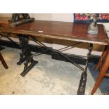 A WOODEN TOPPED CAST BASE PUB TABLE H-72 W-61 L-107 CM