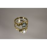 A HALLMARKED 9CT GOLD AQUAMARINE DRESS RING