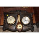 AN OAK BARLEY TWIST COMBINATION CLOCK BAROMETER TOGETHER WITH ANOTHER